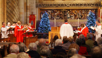 Photograph of Waltham Abbey Choir singing at a christmas service.